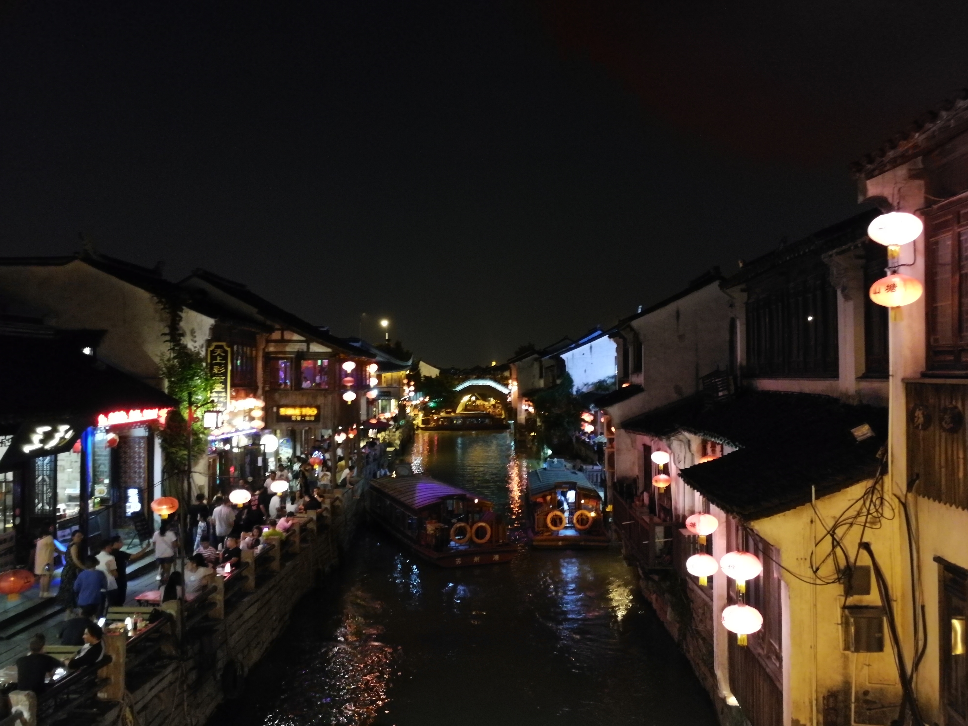 An evening photograph from 2018; the street keeps changing.